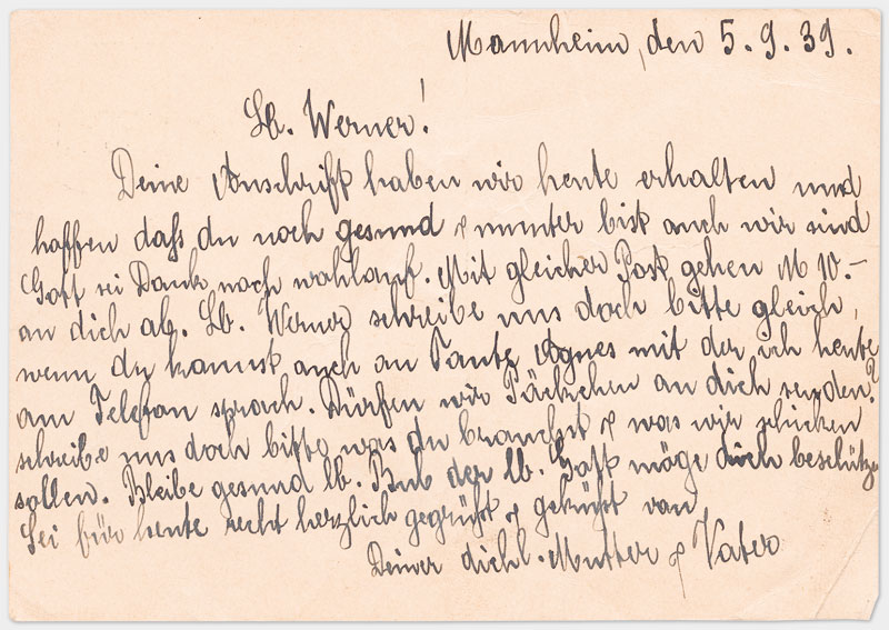 Rückseite der Postkarte mit Text, handschriftlich in schwarzer Tinte